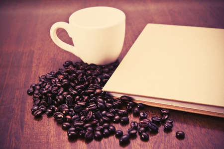Coffee beans with book vintageの写真素材
