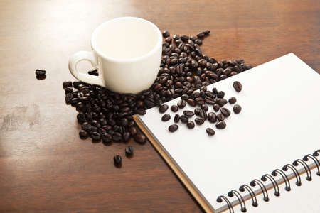 Coffee beans with bookの写真素材