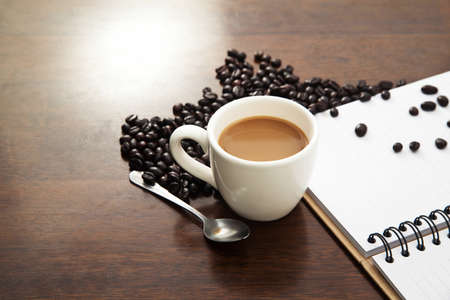 Cup of coffee with bookの写真素材