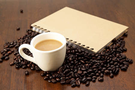 Coffee beans with bookの写真素材