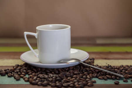 Coffee cup with beansの写真素材