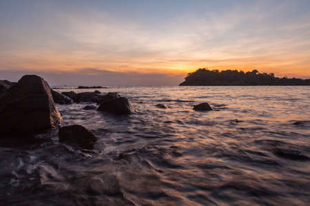 Beautiful HDR sunset over sea beachの写真素材