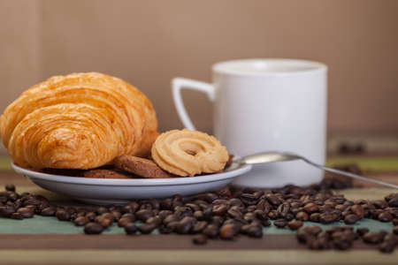 Cookies close up with coffee beansの写真素材