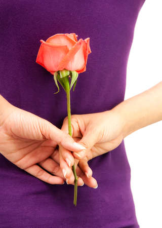 Rose flower hiding behide girl backの写真素材