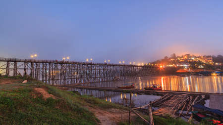Old wooden bridge with misty at dusk twilightの写真素材
