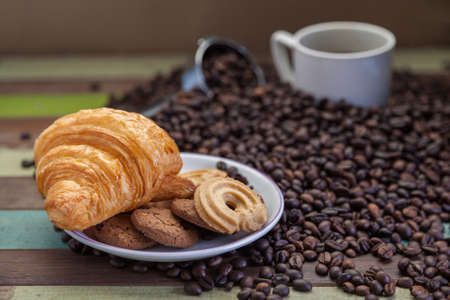 Cookies with coffee beans backgroundの写真素材