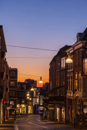 Shopping windows street at sunset