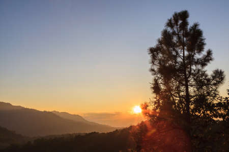 Beautiful sunset over big mountain backgroundの写真素材