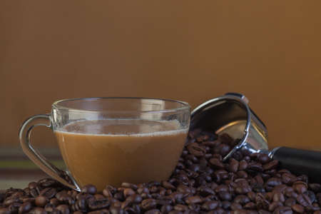 Coffee cup with beans background