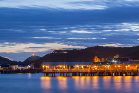 Tropical restuarent in Satthahip bay at sunset twilight, Thailandのeditorial素材