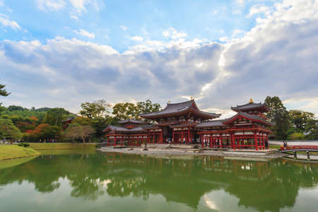 Byodo-in buddhist temple in autumn season against blue sky background at Kyoto, Japanのeditorial素材