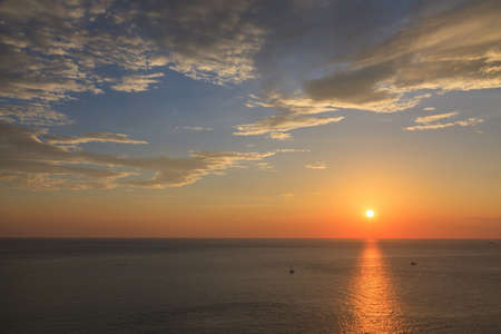 Beautiful sunset at Promthep cape view point, Phuket, Thailandの写真素材