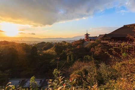 Kiyomizu-dera temple in autumn on sunset sky at Kyoto, Japanの写真素材