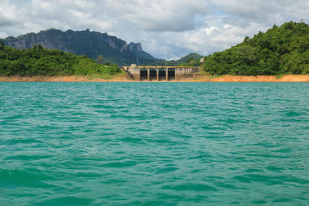 Beautiful mountains lake and natural attractions in Ratchaprapha Dam at Khao Sok National Park, Thailandの写真素材