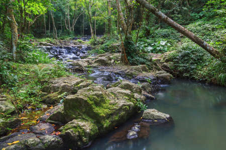 Beatiful of waterfall in national green forest backgroundの写真素材
