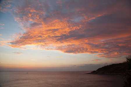 Beautiful sunset at Promthep cape view point, Phuket, Thailandの写真素材