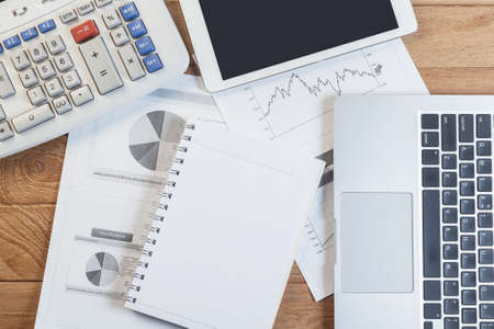 Business woman putting her hand on calculator, business and investment conceptの写真素材