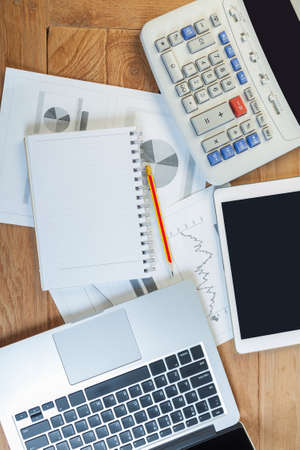 Business woman putting her hand on calculator, business and investment conceptの写真素材