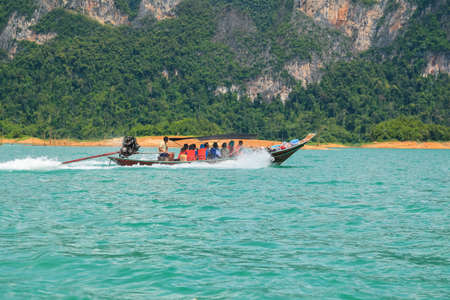 Beautiful landscape of Khao sok national park with long tail boat at suratthani,Thailand