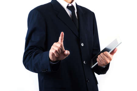 Business man holding tablet isolated on white backgroundの写真素材