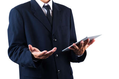 Business man holding tablet isolated on white backgroundの写真素材