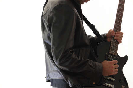  master guitarist playing his black guitar soloの写真素材