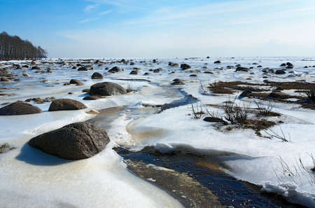 Landscape with rocks in the snowの写真素材