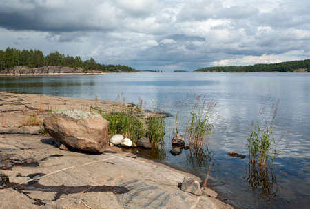 Summer landscape with clouds. Lake Ladogaの写真素材