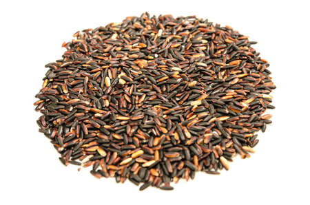 black thai rice isolated on white backgroundの写真素材