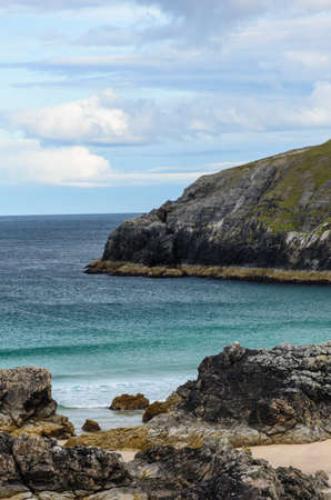 rocky coastline with sandy beaches の写真素材