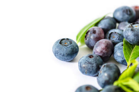 pile of blueberries isolated on white backgroundの写真素材