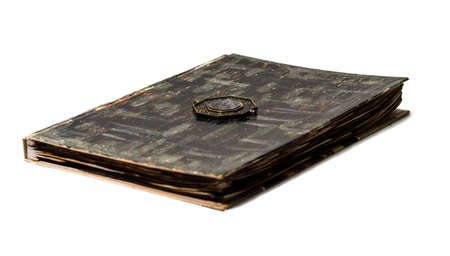 old and burned book with sign on the cover
