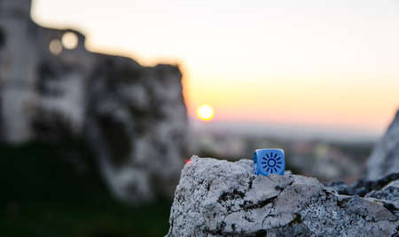 weather dice with sun sketch on castle background - stock photoの写真素材