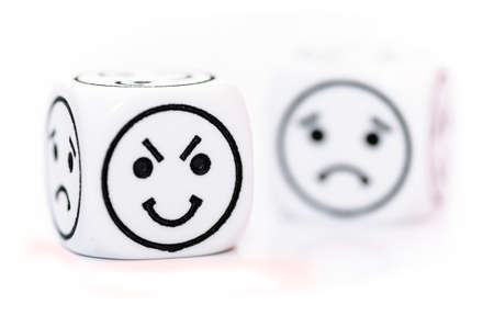 emoticon dice with happy and sad expression sketch isolated on white backgroundの写真素材