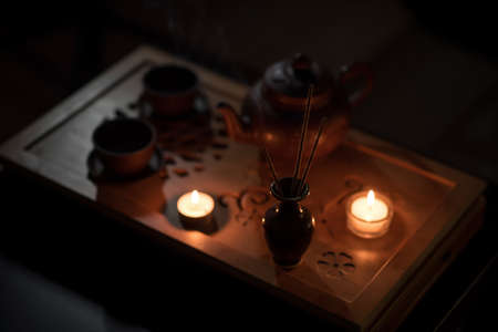 Tea ceremony with candlesの写真素材