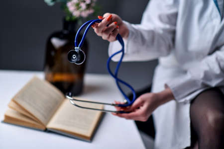 A stethoscope in the handsの写真素材
