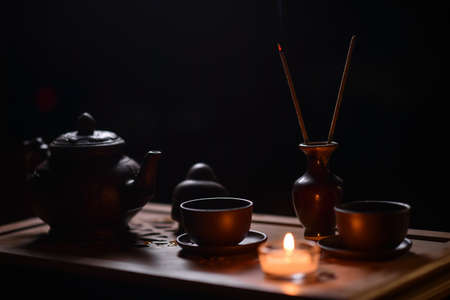 Tea ceremony with candlesの写真素材