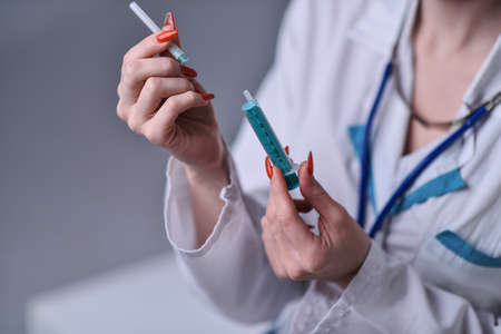 Syringe with medication from the doctorの写真素材
