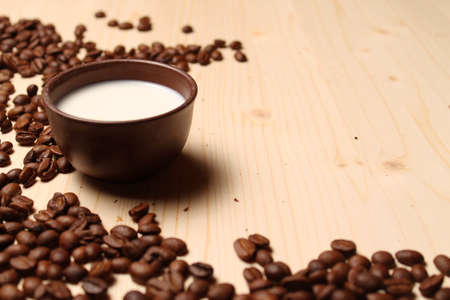 Coffee and milk on the tableの写真素材