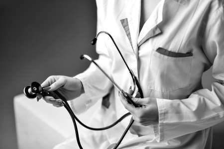 A stethoscope in the handsの写真素材