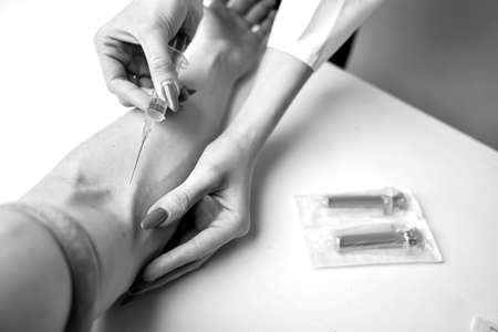 A stethoscope in the handsの写真素材