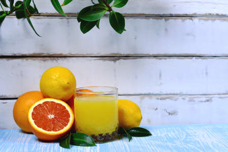 Fruit and juice on the tableの写真素材