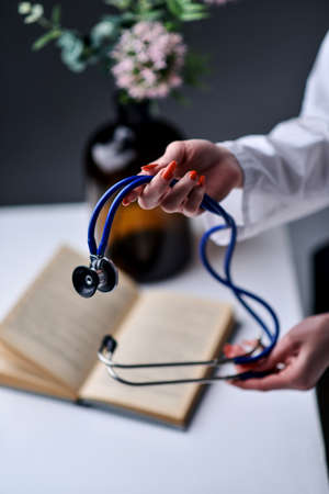 A stethoscope in the handsの写真素材