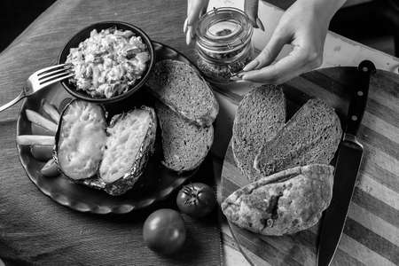 Preparation of potatoes with mushrooms and vegetablesの写真素材