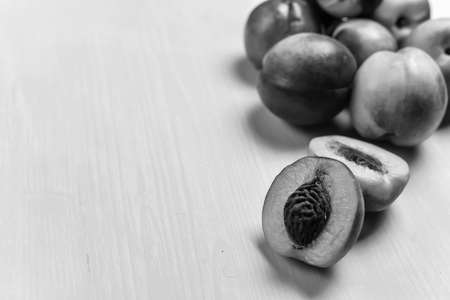 composition of ripe peaches black and white poster