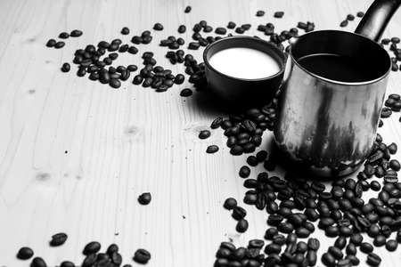 Coffee beans and milk and cookies