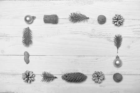 Christmas tree and objects on a white wooden background