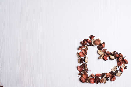 The frame of dried flowers on the tableの写真素材