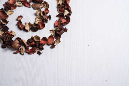 The frame of dried flowers on the tableの写真素材