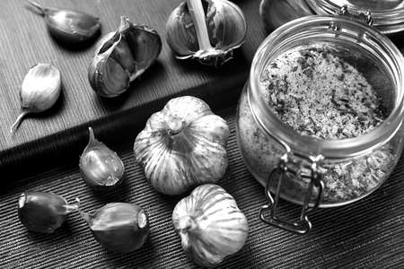 Garlic lying on the table. Food in the house. Medication againstの写真素材